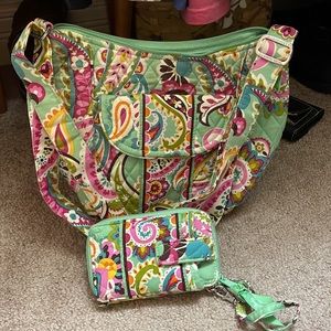 Vera Bradley crossbody or can be used on the shoulder and matching wallet